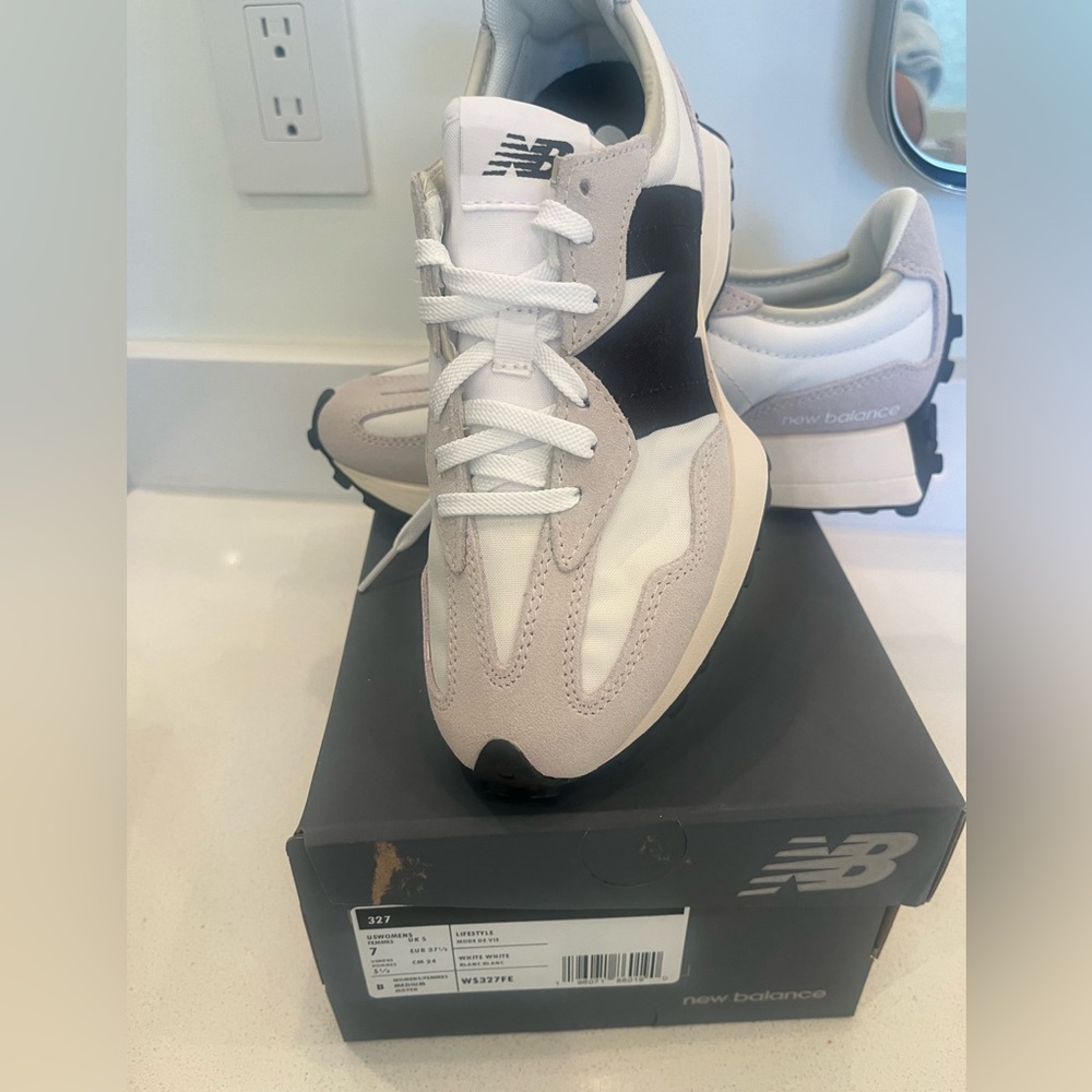 New in box, never worn Women's New Balance 327's, size 7.